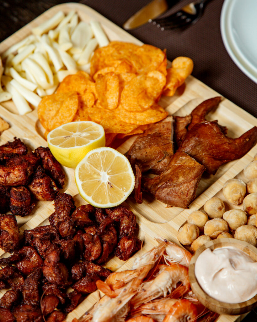 various snacks on plate for beer